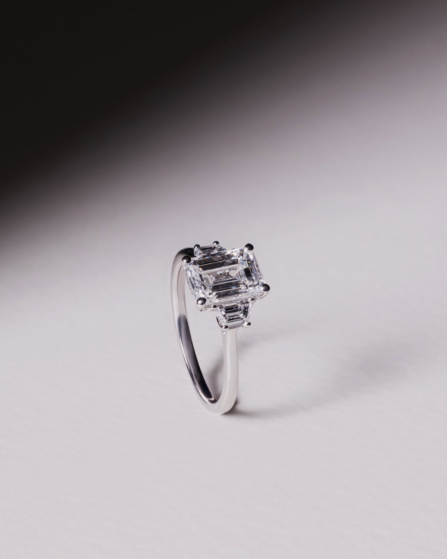 Emerald Cut Trilogy Engagement Ring (Yellow Gold)